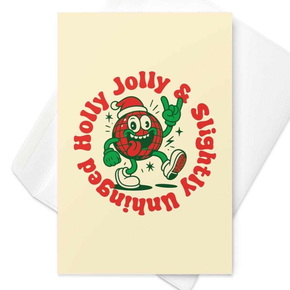 Funny Christmas greeting card featuring a retro disco ball character wearing a Santa hat with circular text reading “Holly Jolly Slightly Unhinged.”