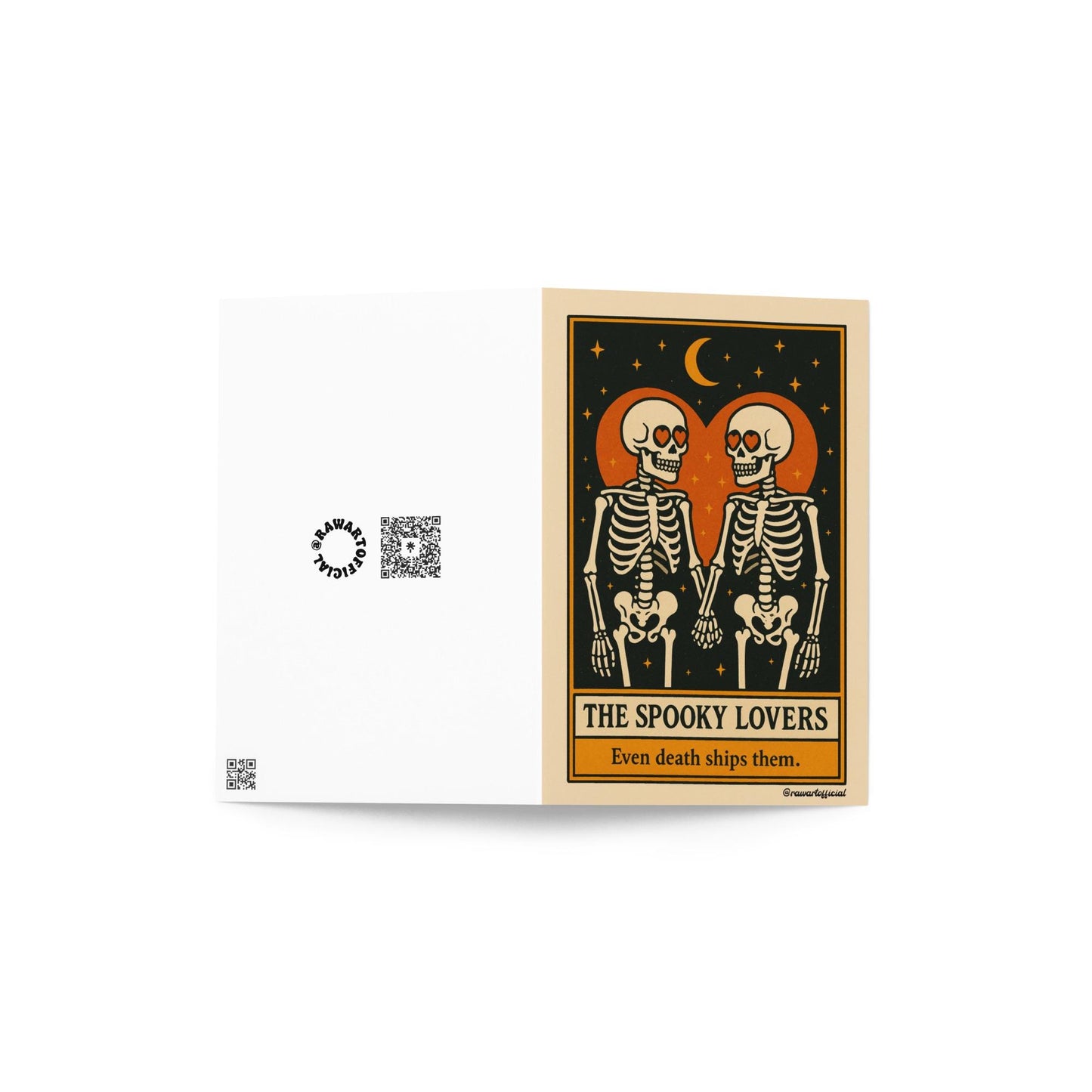 Tarot-style greeting card featuring two skeletons with heart-shaped eyes holding hands under a crescent moon, framed by an orange heart on a black starry background with the text “The Spooky Lovers – Even death ships them.”