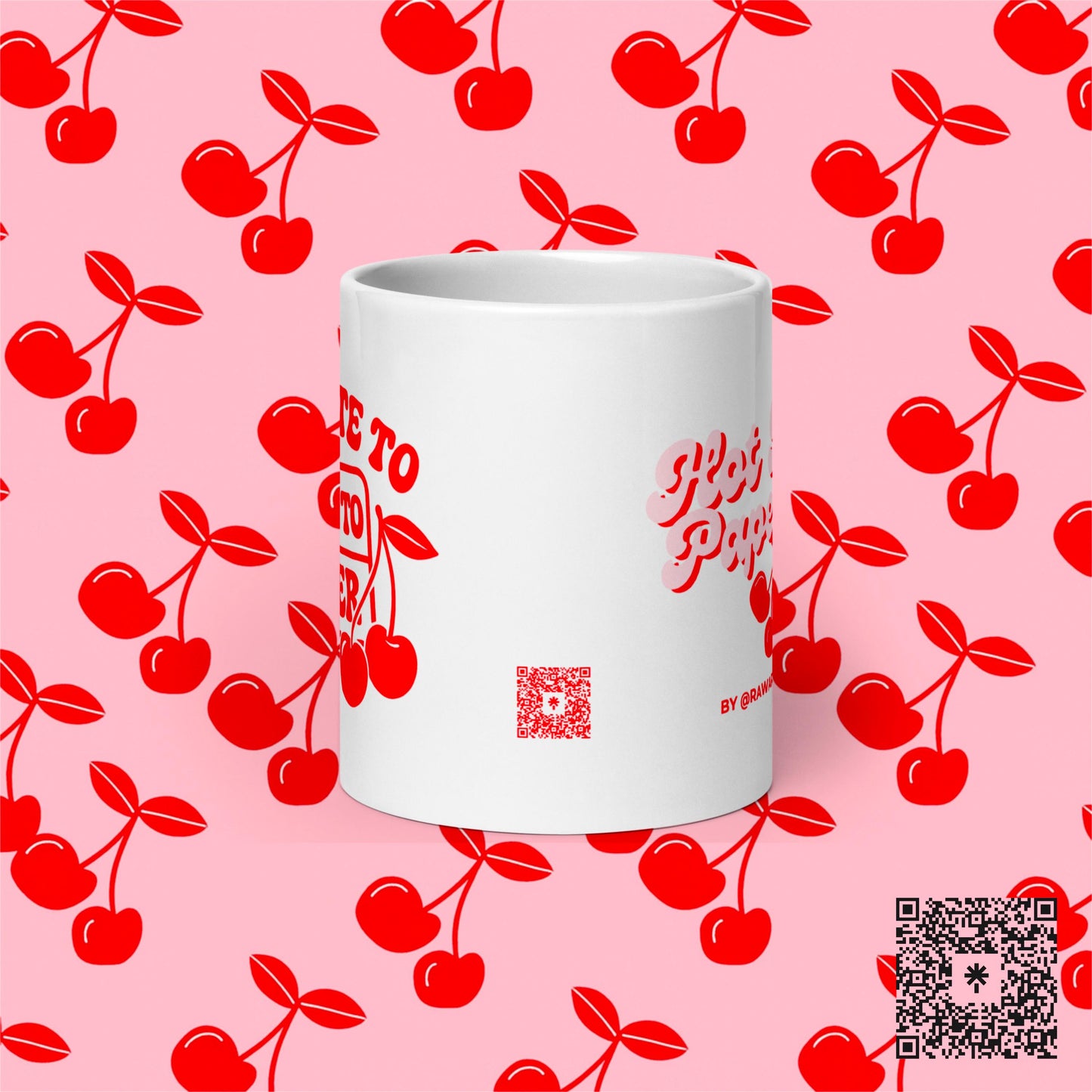 Side view of cherry mug with retro red design, pink background