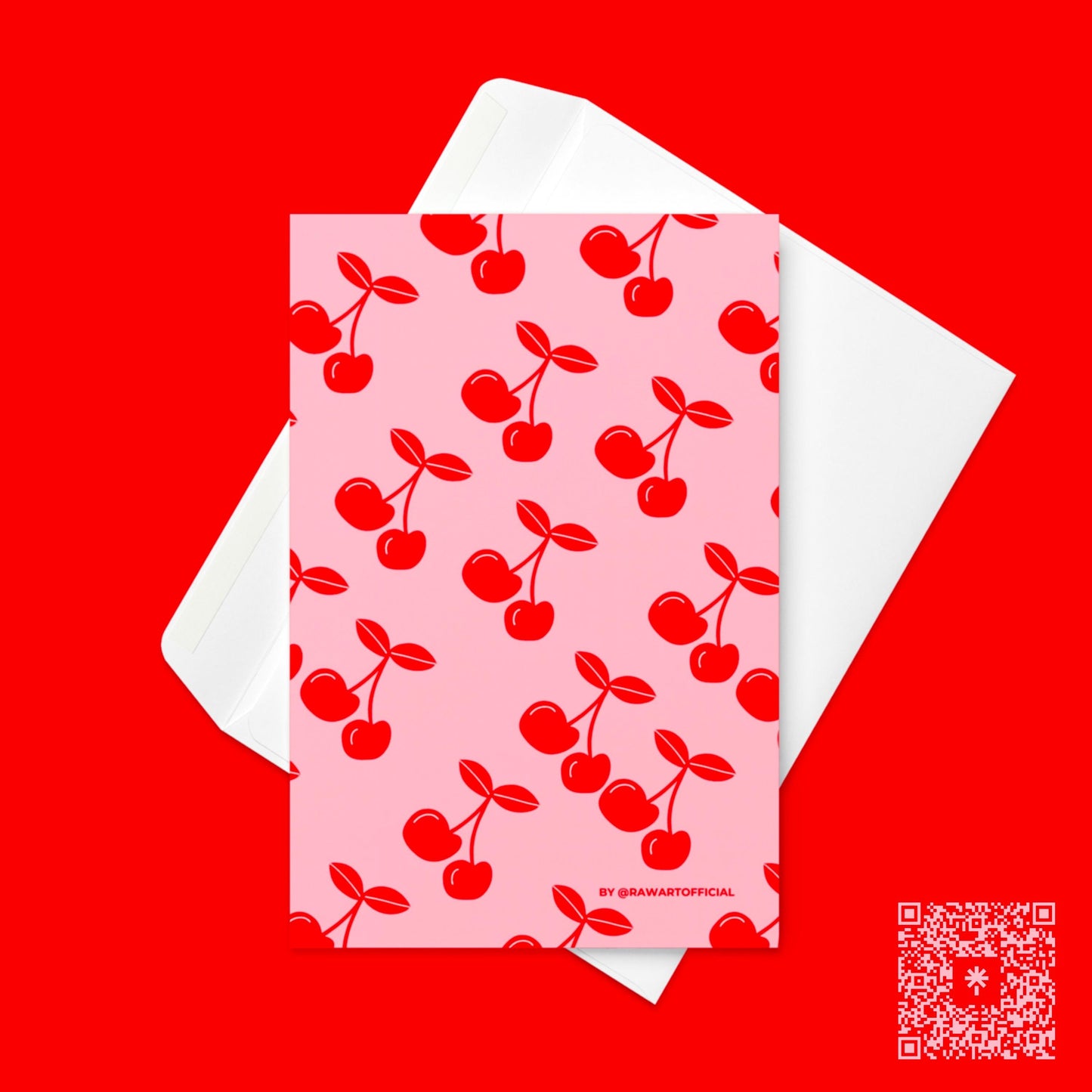 Cherry print greeting card with envelope on red background