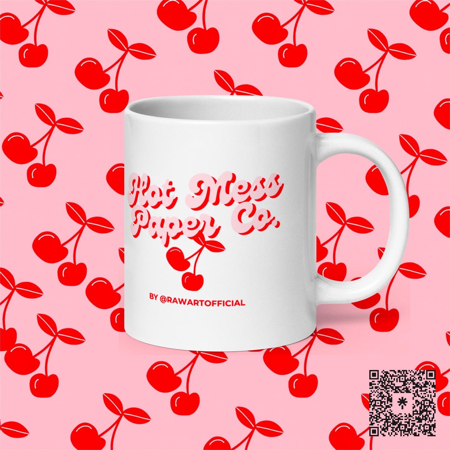White mug with Hot Mess Paper Co. cherry design, pink cherry background