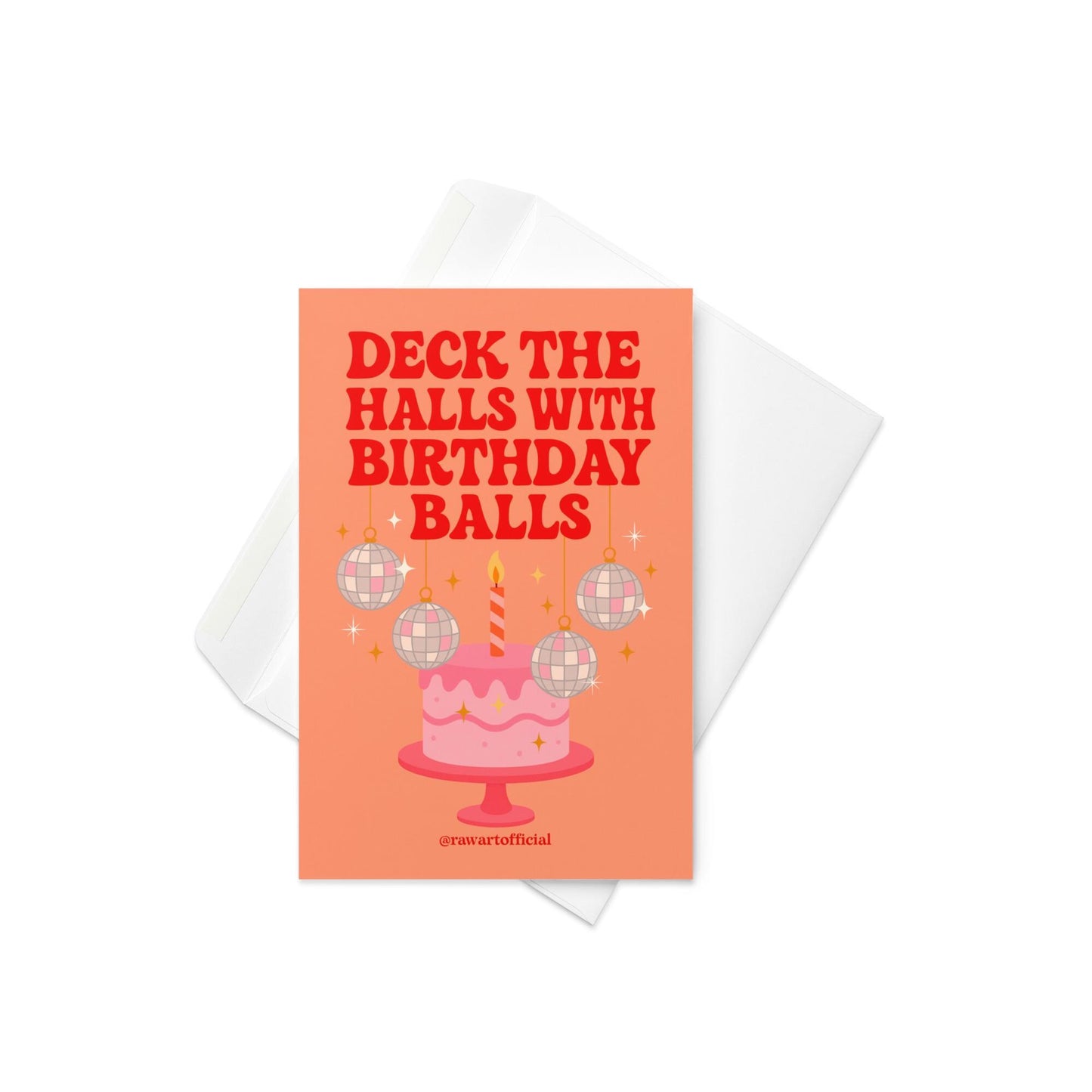 Retro holiday birthday card featuring a pink cake with a striped candle and hanging disco ball ornaments. Text reads “Deck the Halls with Birthday Balls” in bold red letters on an orange background.