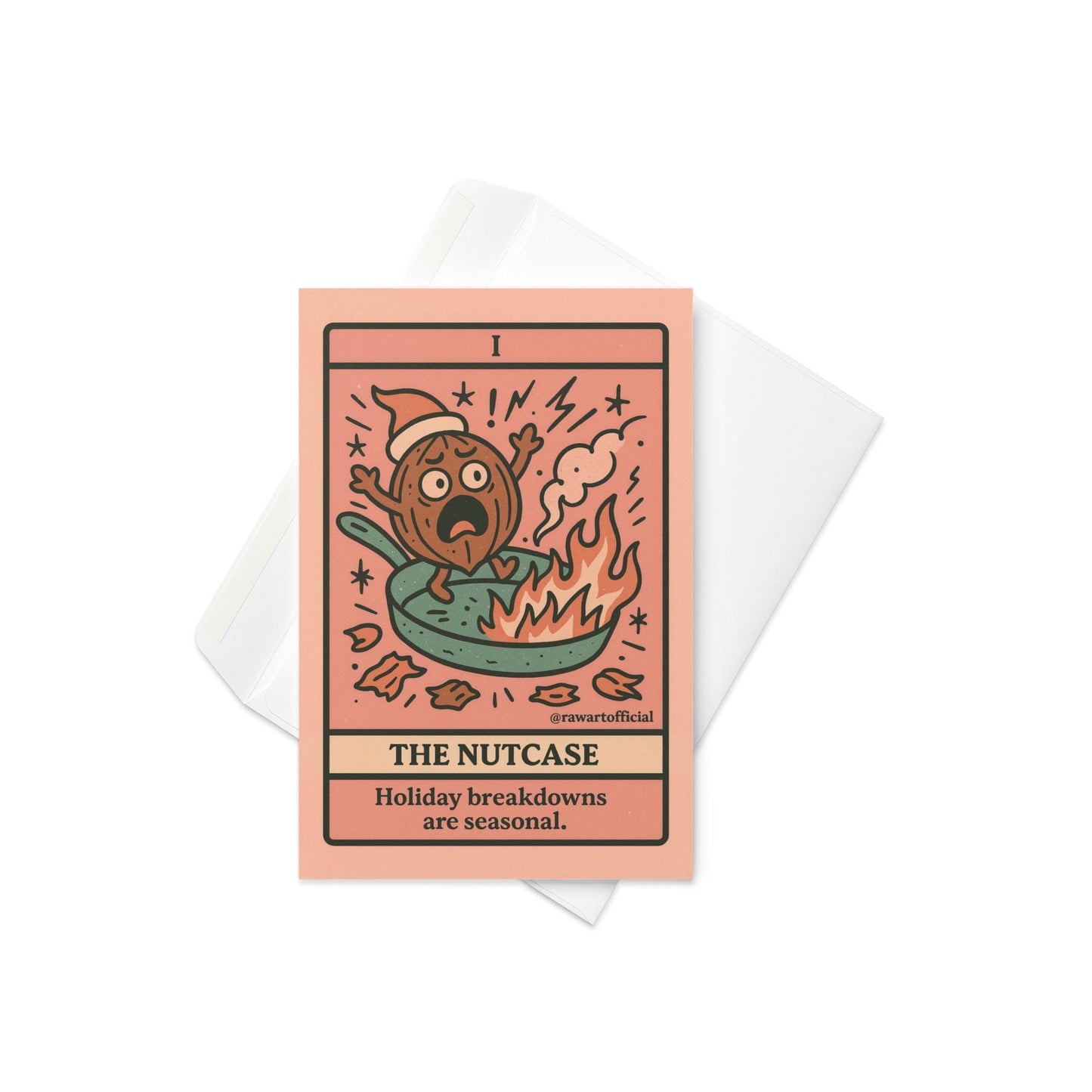 Retro tarot-style Christmas card featuring a panicked nut character in a frying pan with flames and text “The Nutcase – Holiday breakdowns are seasonal”