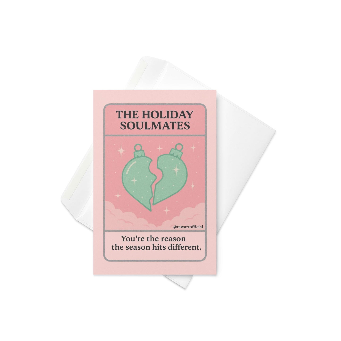 Pink tarot-style card with two ornament halves forming a heart and text “The Holiday Soulmates.”