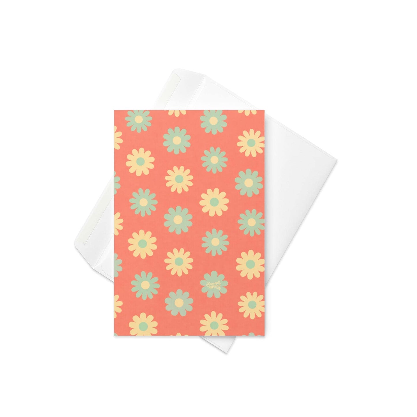 coral card with repeating retro mint and yellow daisy flower pattern spring design