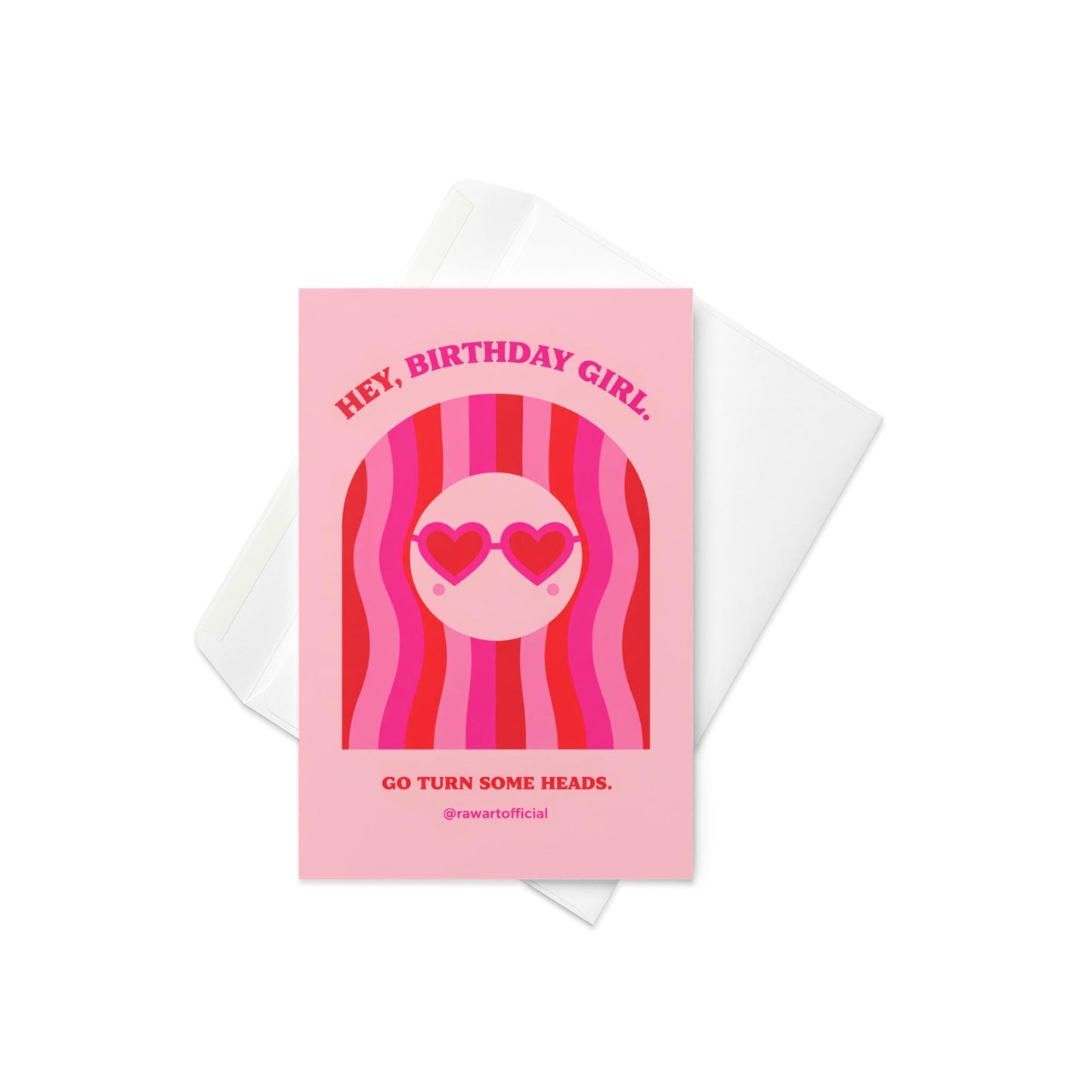 Pink birthday card featuring a girl with wavy red and pink hair and heart-shaped sunglasses with the phrase “Hey, Birthday Girl. Go Turn Some Heads.”