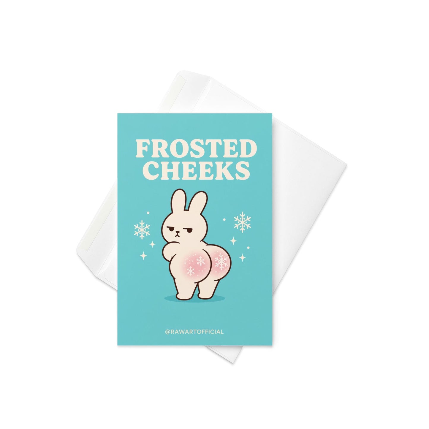 Funny Christmas card featuring a grumpy bunny with snowflake cheeks beside the phrase “Frosted Cheeks.”