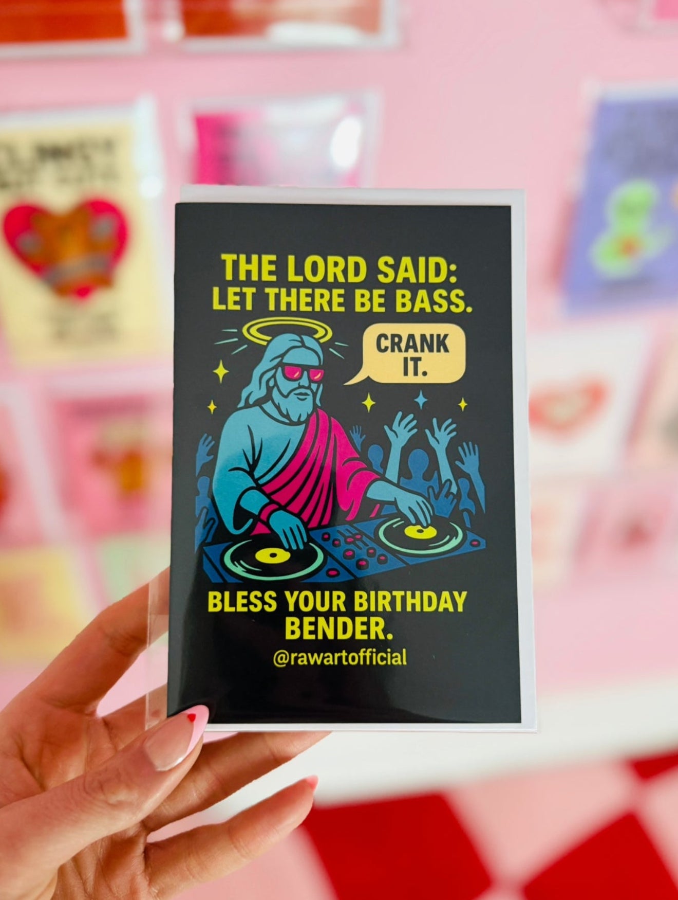 Funny DJ Jesus rave birthday card with neon colors, bass humor, and dancing crowd.