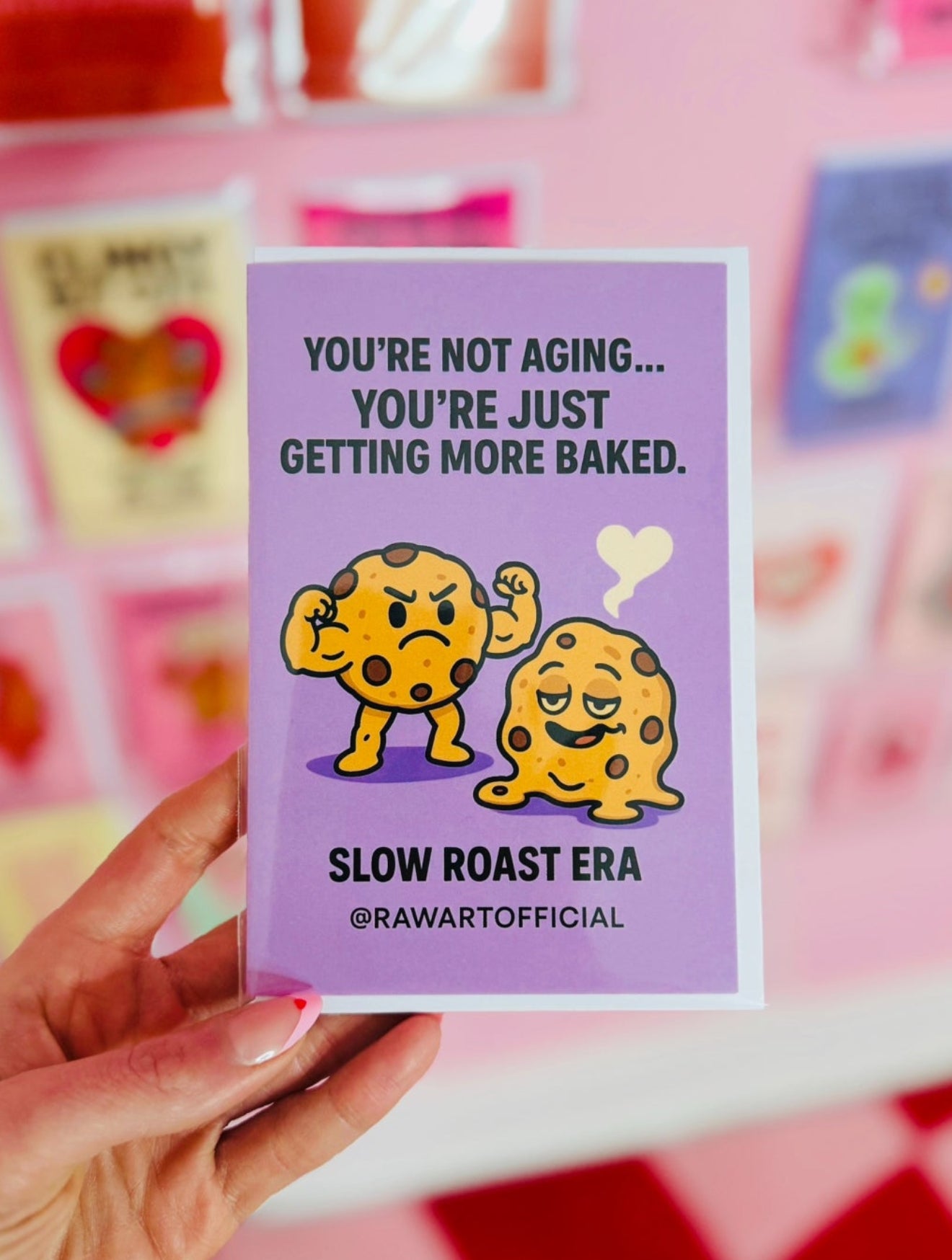 Cartoon buff cookie and melted cookie with heart smoke on purple background, funny stoner birthday card by @rawartofficial.