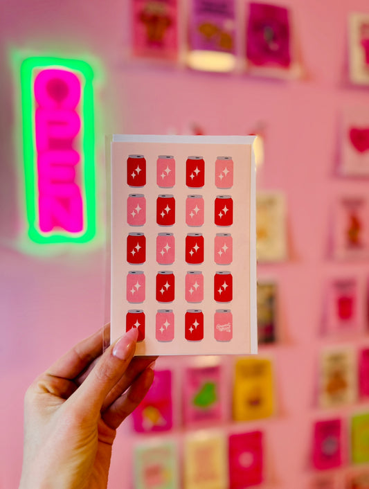 Pink and red soda can pattern with sparkles in a retro pop-art Valentine card design.