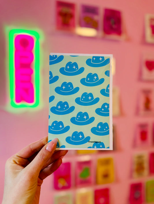 Retro sparkly blue cowgirl hat card in Y2K western aesthetic