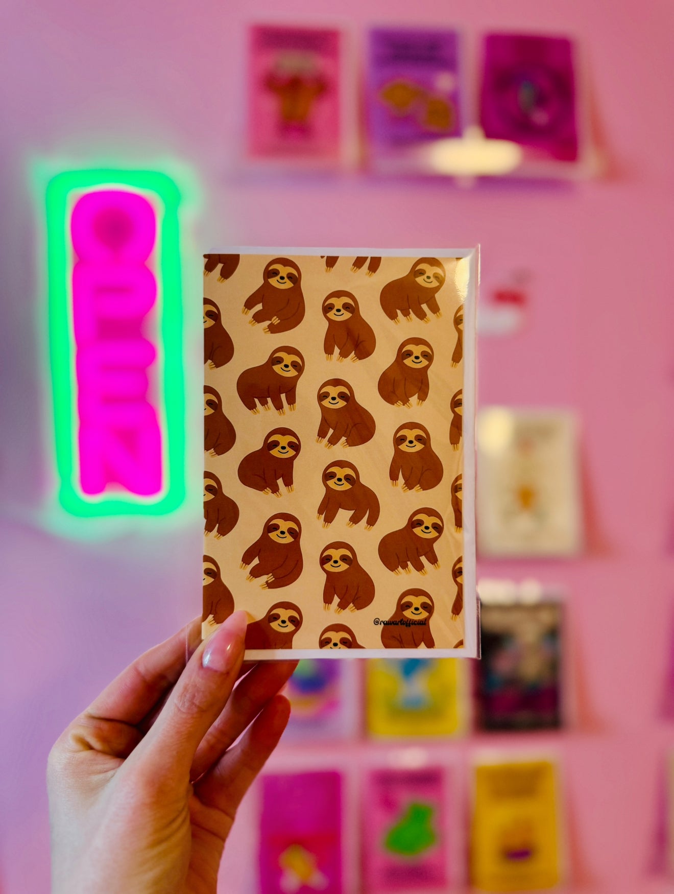 Retro sloth greeting card with cute repeating cartoon sloths in a playful pattern