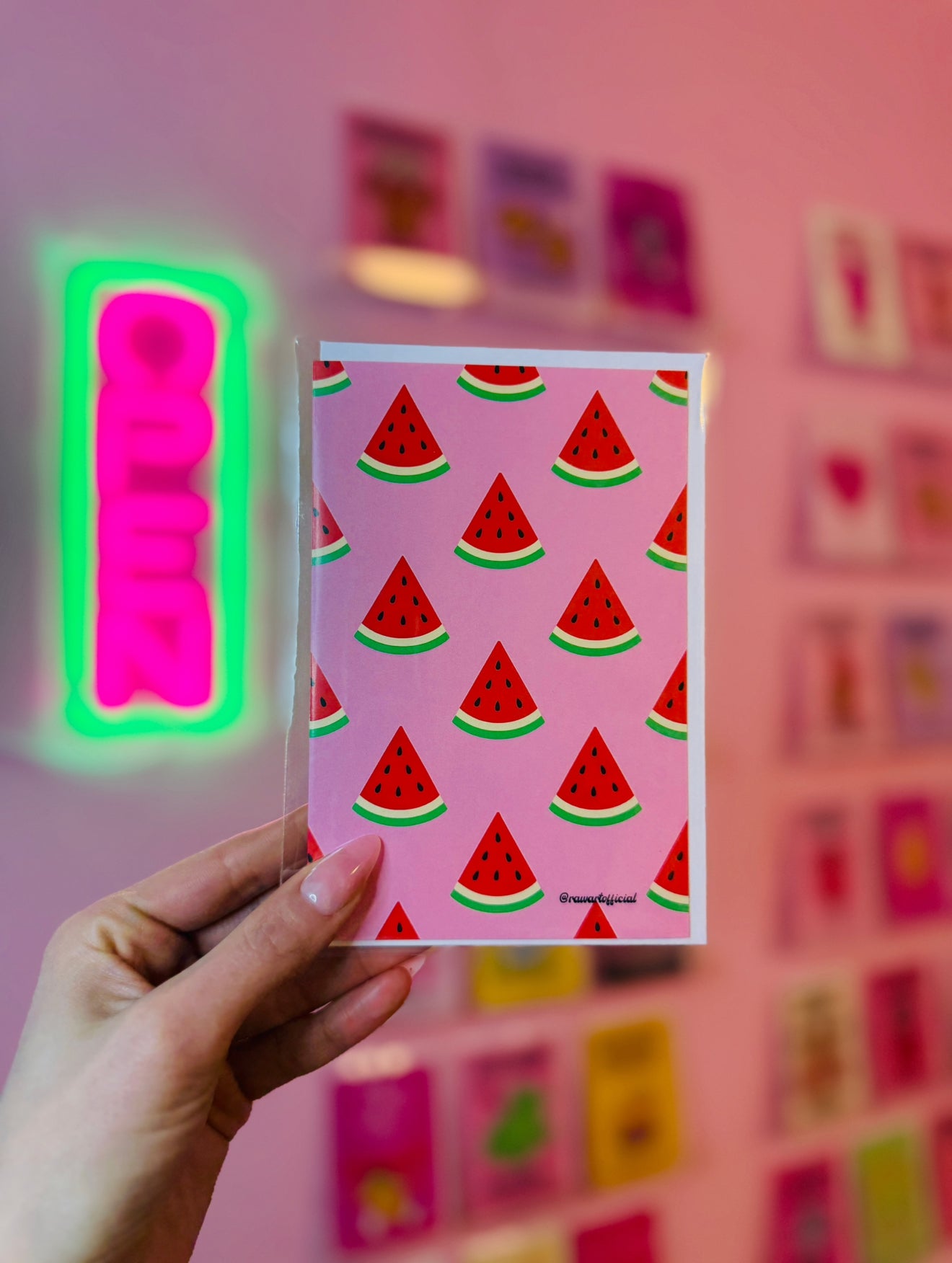 Pink greeting card with repeating watermelon slice pattern in bold retro Y2K style.