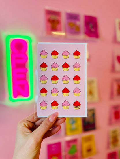 Cute cupcake pattern card with pink and red cupcakes on pastel background sweet bakery design