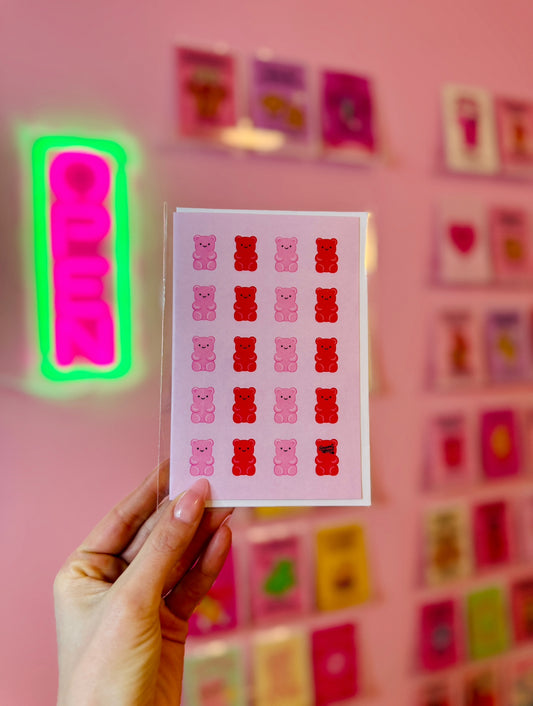 pink card with repeating pink and red gummy bears cute candy pattern design