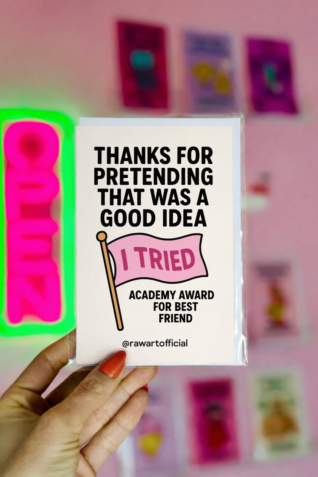 Minimal thank you card with bold black text reading “Thanks For Pretending That Was a Good Idea” and a pink flag that says “I Tried.”