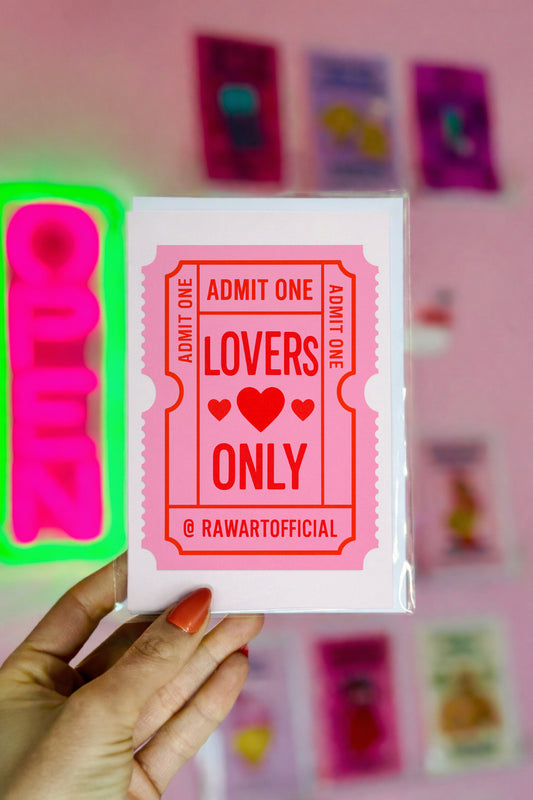 Romantic anniversary or Valentines card with pink ticket design that reads “Admit One Lovers Only” with hearts.