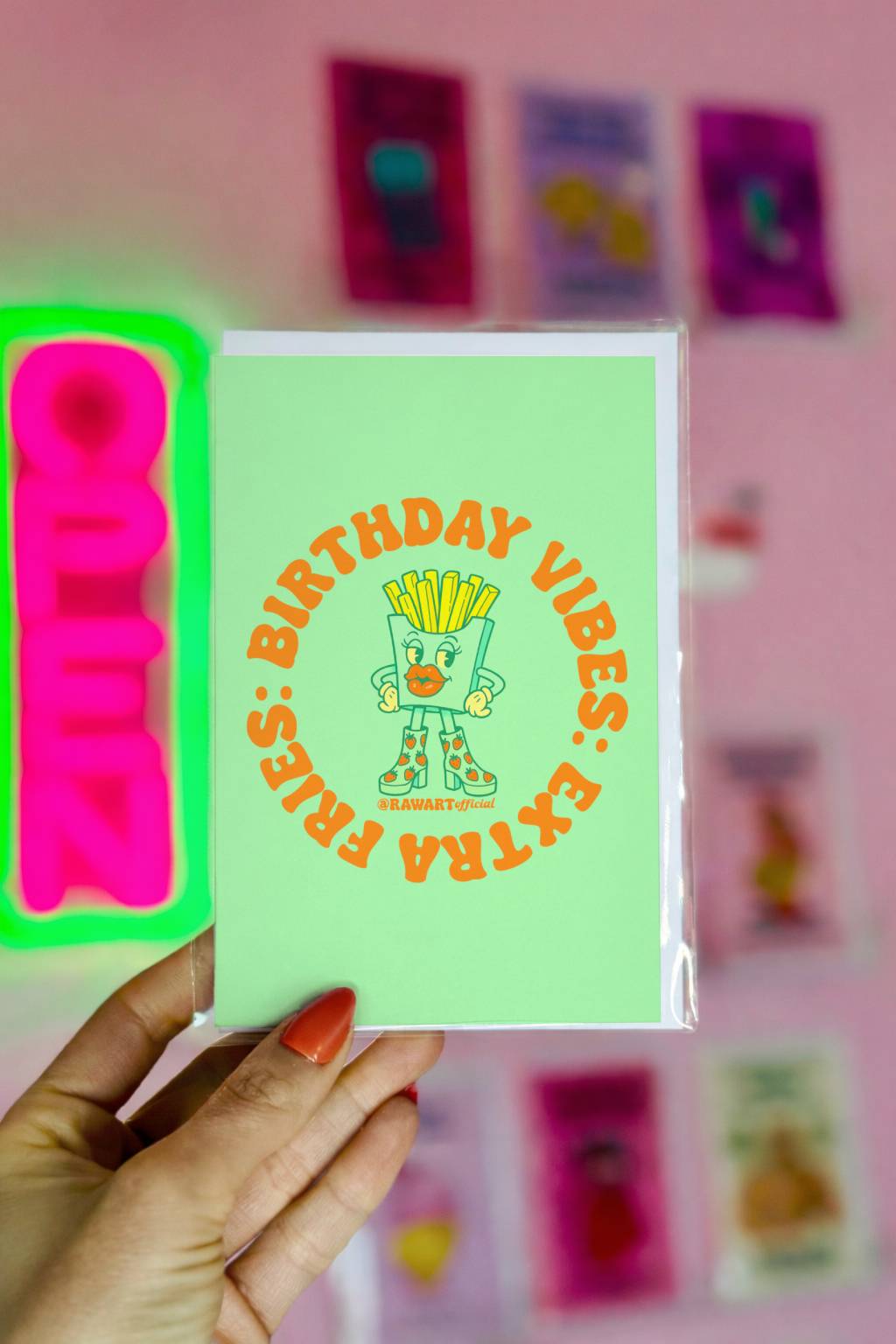 Mint green birthday card featuring retro fries character with circular orange text reading “Extra Fries. Birthday Vibes.”