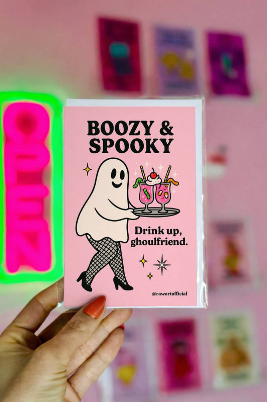 Retro ghost in fishnets serving cocktails with text “Boozy & Spooky – Drink up, ghoulfriend.”