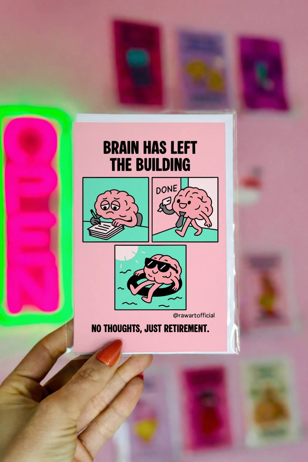 Funny pink retirement card featuring a cartoon brain relaxing on a pool float with the text “No Thoughts, Just Retirement”