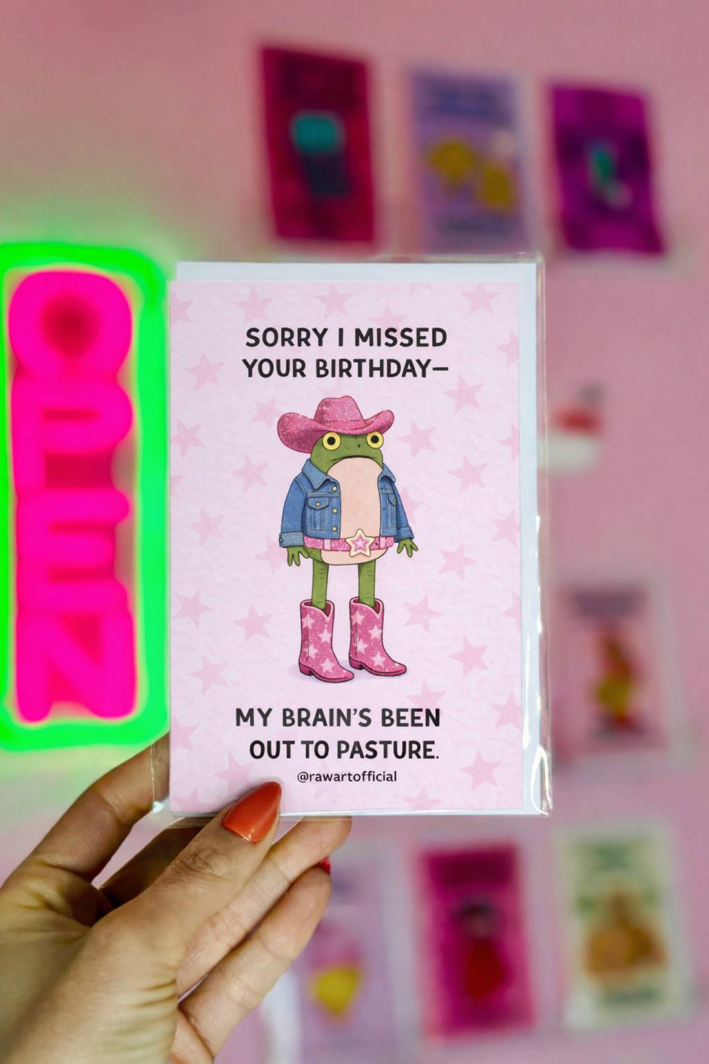 cowgirl frog apology birthday card with pink boots denim jacket and western theme late birthday greeting