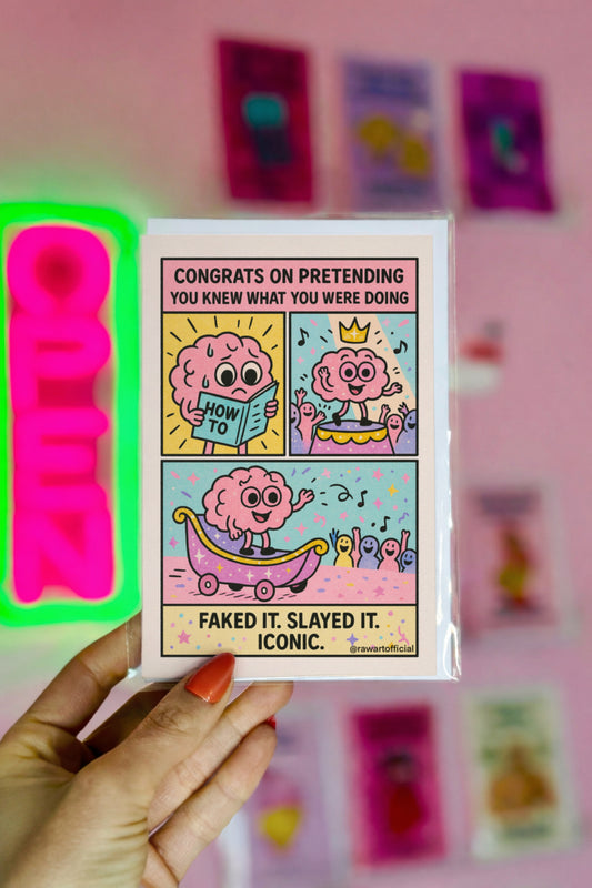 Funny pastel greeting card featuring a cartoon brain faking its way through life—reading a “How To” book, standing victorious on a podium, and waving from a glittery parade float. Text reads: “Congrats on pretending you knew what you were doing. Faked it. Slayed it. Iconic.”