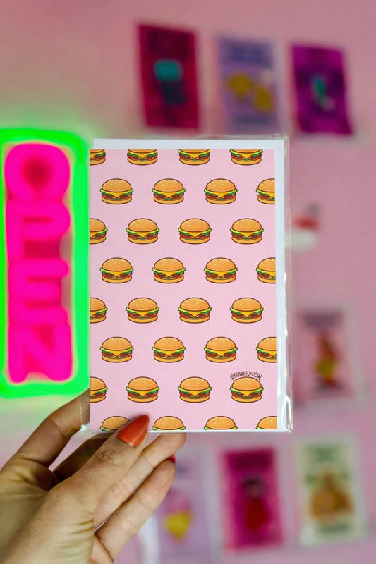 Cute greeting card featuring a repeating cheeseburger pattern on a pink background in a playful retro style