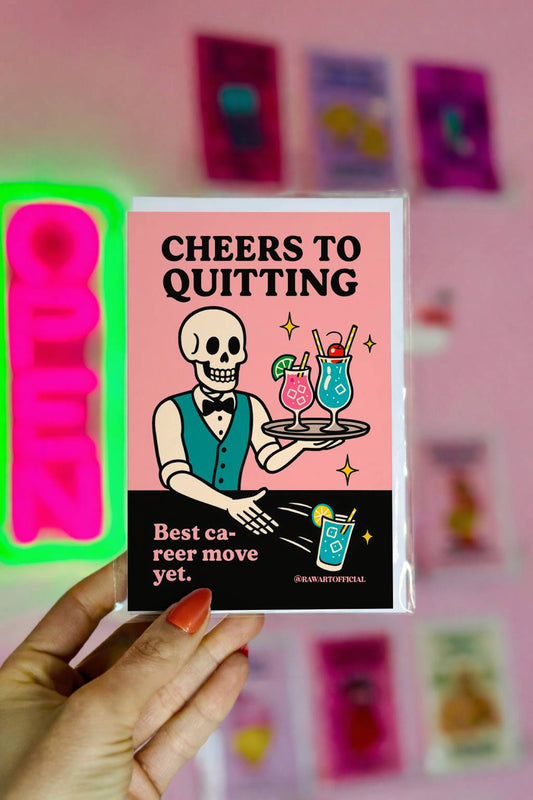 Pink spooky resignation card featuring a skeleton bartender holding cocktails with the phrase “Cheers to Quitting.”