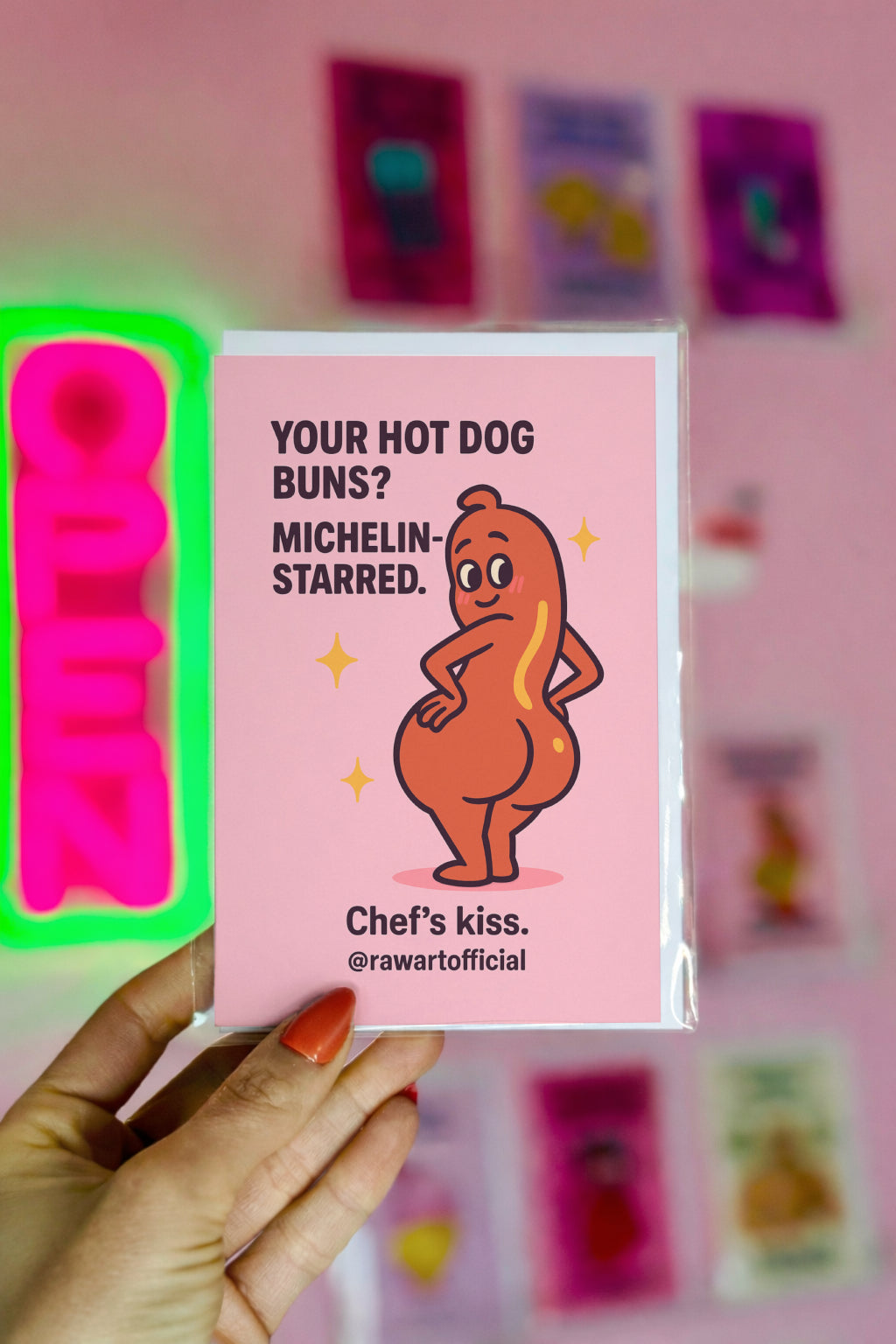 Flirty cartoon hot dog posing with big buns and sparkles on a pink Valentine or Anniversary card.
