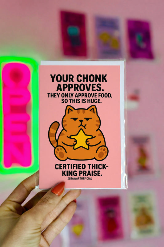 Chonky orange cat holding a star on a pink background with bold funny approval text.