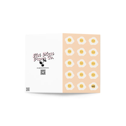 pink card with repeating cute smiley fried eggs breakfast pattern