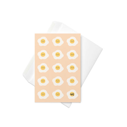 pink card with repeating cute smiley fried eggs breakfast pattern