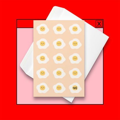 pink card with repeating cute smiley fried eggs breakfast pattern