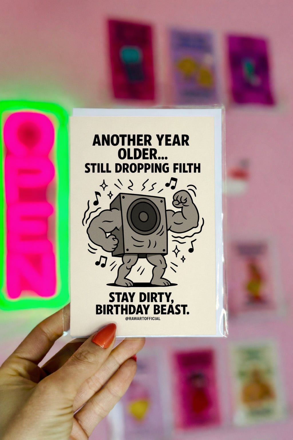 Buff subwoofer flexing with music notes around it and bold text saying “Still Dropping Filth.”