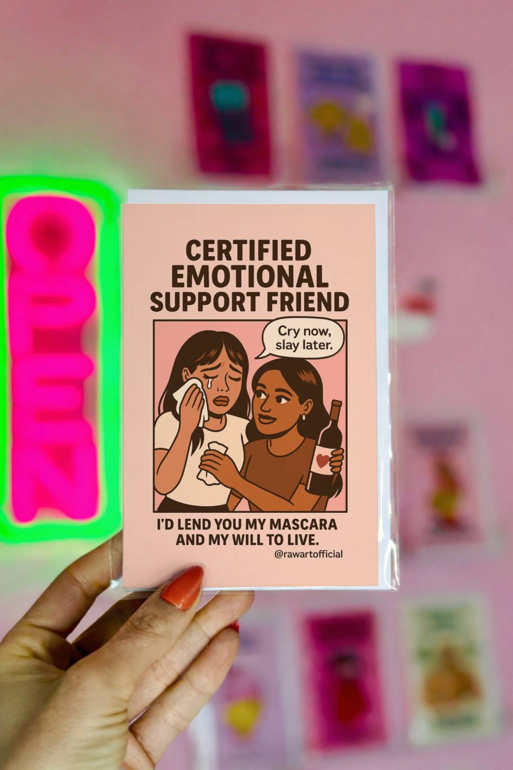 Greeting card featuring two friends comforting each other with the text “Certified Emotional Support Friend – I’d Lend You My Mascara and My Will to Live.”