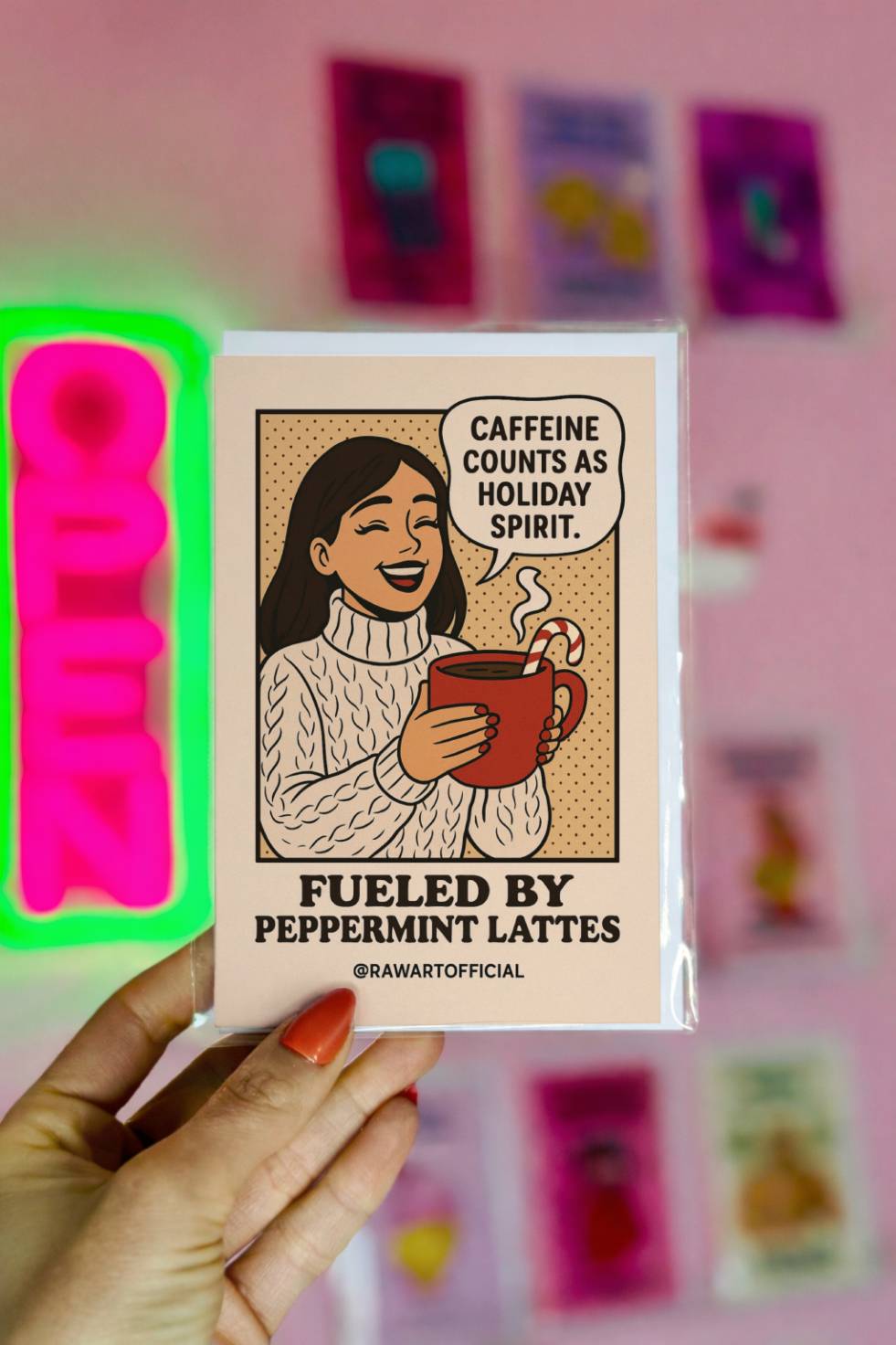 Funny Christmas greeting card featuring a retro comic-style woman holding a peppermint latte with a candy cane stirrer and the text “Fueled by Peppermint Lattes.”