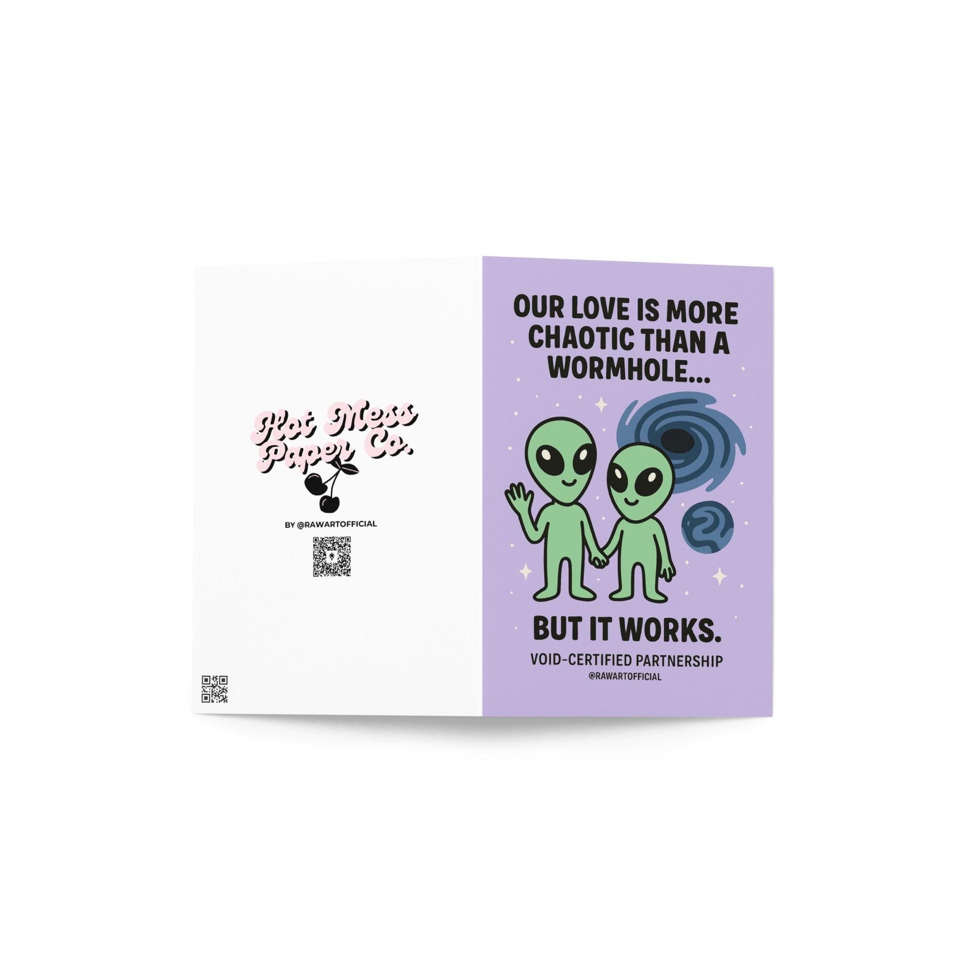 Greeting card with a purple background featuring two green alien figures and the text "OUR LOVE IS MORE CHAOTIC THAN A WORMHOLE... BUT IT WORKS." 
