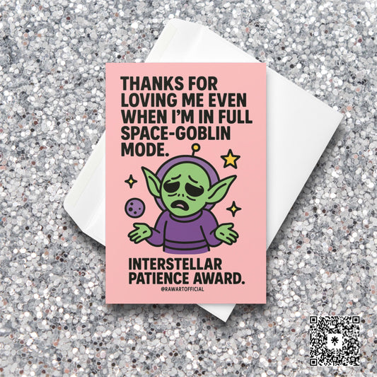 Pink card with sad green space goblin shrugging in a purple suit, with stars and text saying “Thanks for loving me even when I'm in full space-goblin mode.”