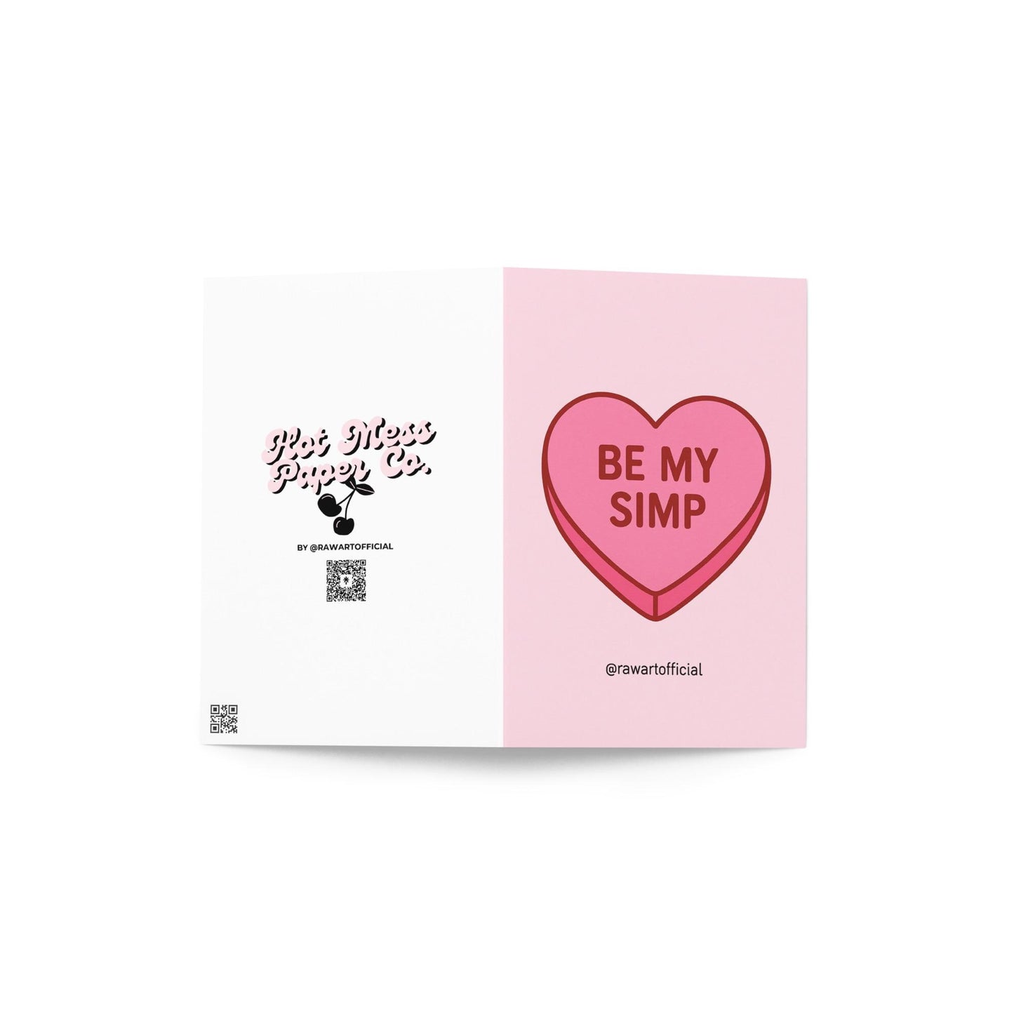 Pink candy heart card with the phrase “Be My Simp” in red text on a soft pink background.