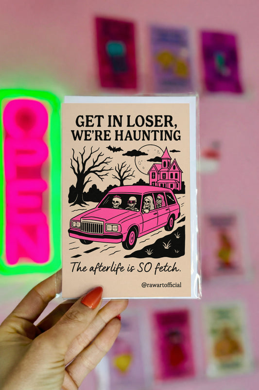 Greeting card with skeletons in a pink car saying “Get in loser, we’re haunting” — spooky cute Mean Girls parody Halloween design.