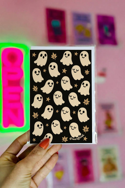 Cute ghost pattern greeting card with retro kawaii ghosts, stars, and fall leaves on a black background.
