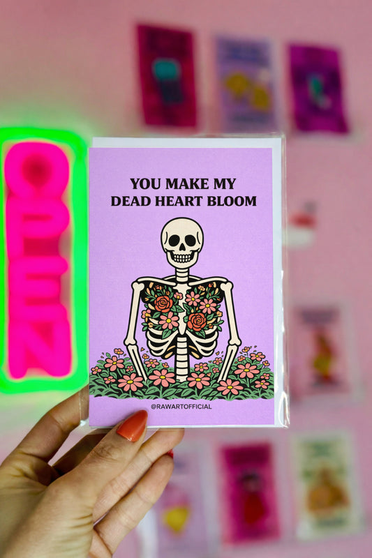 skeleton with flowers blooming from chest spooky spring anniversary card purple background illustration