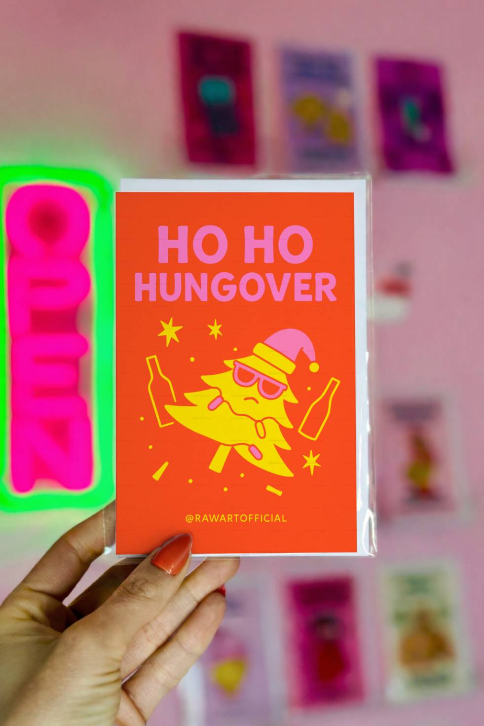 Funny Christmas greeting card with dizzy Christmas tree and text “Ho Ho Hungover.”