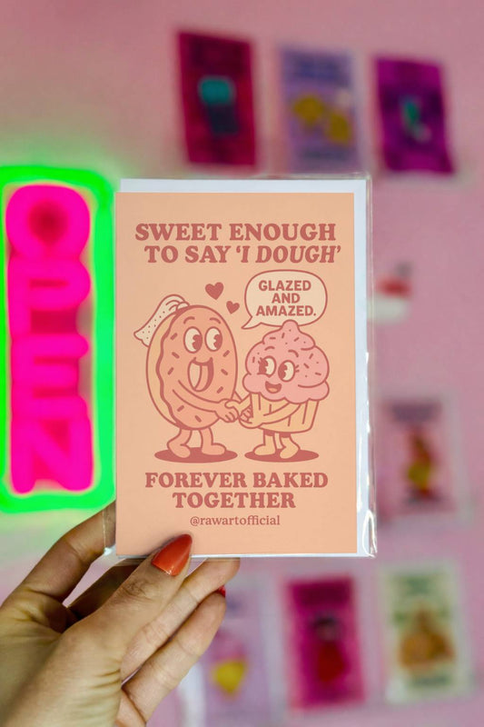 Retro peach card with cartoon donut and cupcake holding hands, text reads “Sweet Enough to Say I Dough” and “Forever Baked Together.”
