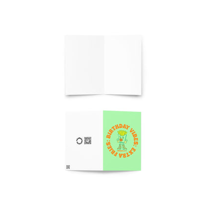 Mint green birthday card featuring retro fries character with circular orange text reading “Extra Fries. Birthday Vibes.”