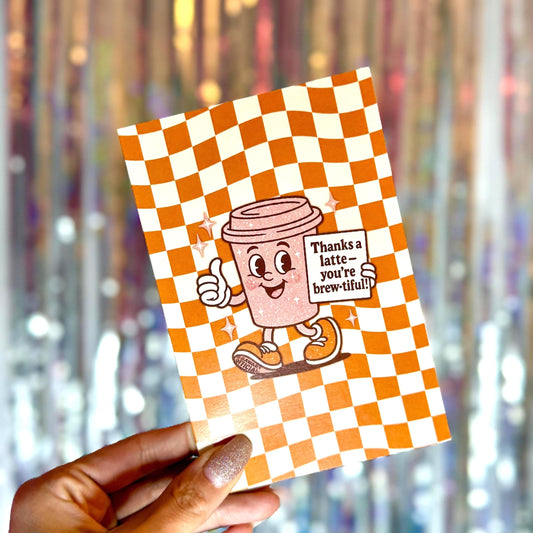 Retro orange checkered coffee cup Thank you greeting card with text “Thanks a latte - you&#39;re brewtiful!&quot;