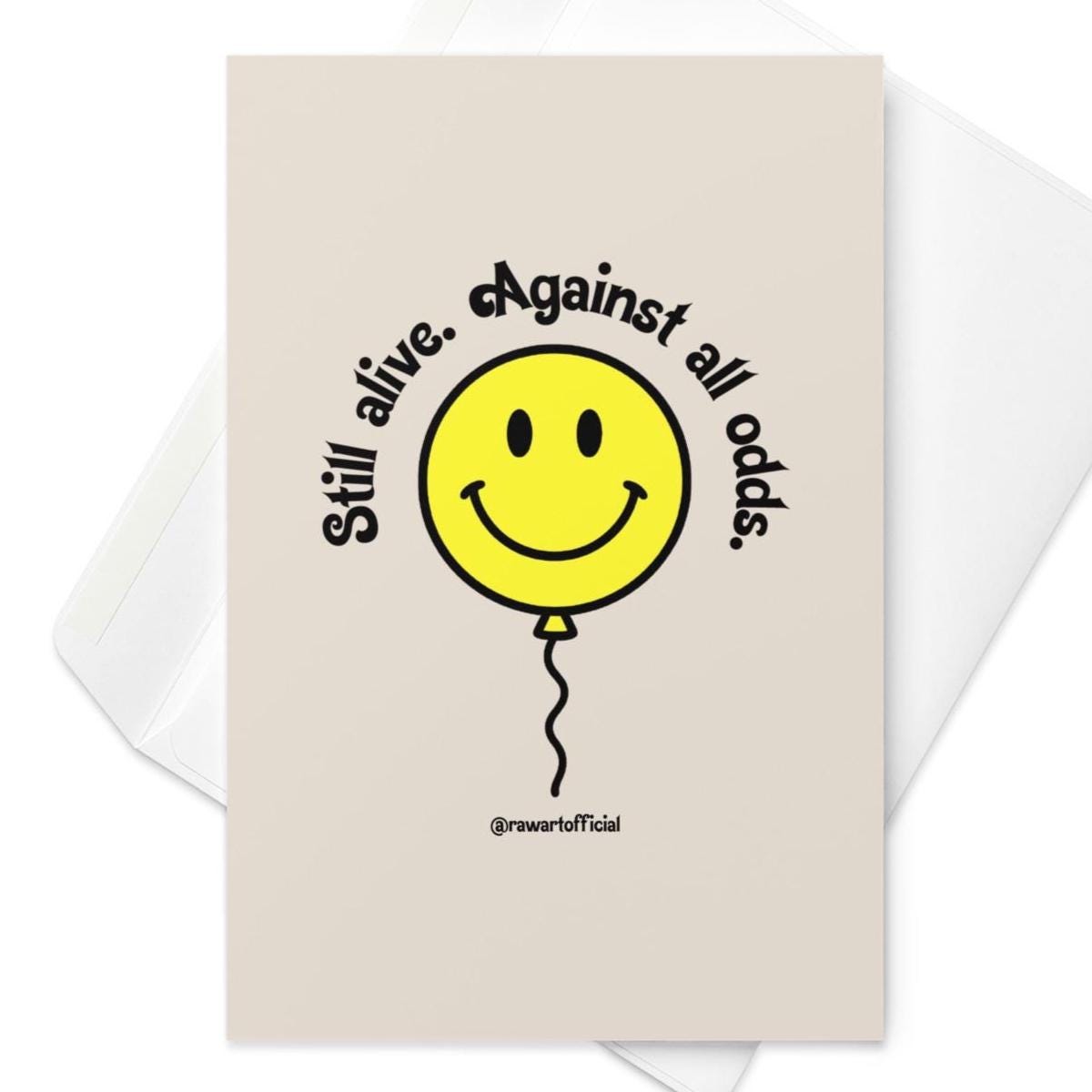 Retro yellow smiley balloon with text “Still alive. Against all odds.” on beige background