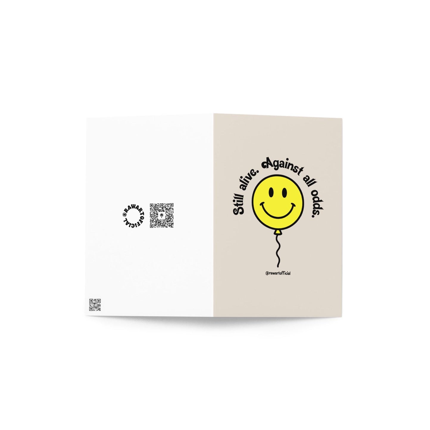 Retro yellow smiley balloon with text “Still alive. Against all odds.” on beige background
