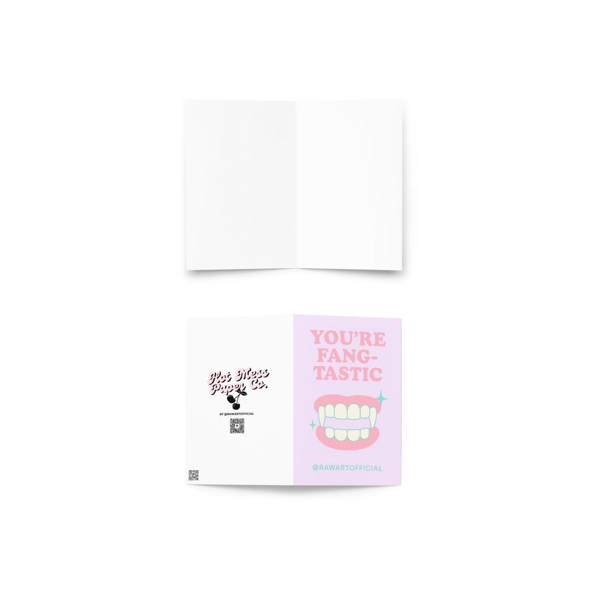 “You’re Fangtastic” Halloween card with cartoon vampire fangs in pastel pink and mint