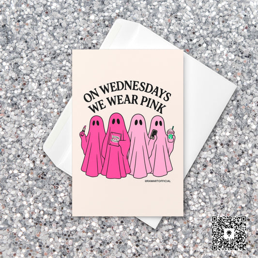 Greeting card with four pink cartoon ghosts holding lipstick, Burn Book, coffee, and phone, captioned “On Wednesdays We Wear Pink.”
